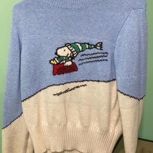 Snoopy sledding sweater